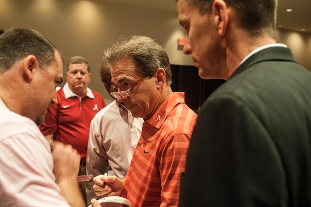 Coach Saban spent some time signing autographs for fans