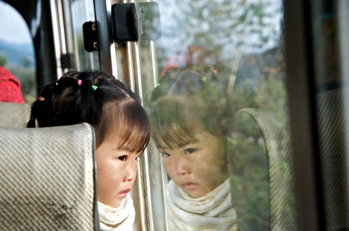 Young girl on a bus near Phongsali