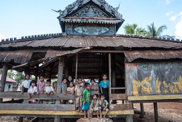 Kids hanging out at the village temple
