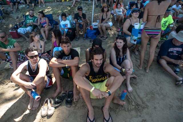 A crowd watches the surfing competition in Jobos, Isabela